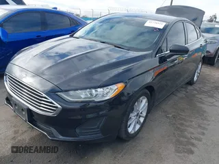 2020 Ford Fusion Hybrid SE with VIN 3FA6P0LU3LR113987, listed as a IAAI auction lot 41778511 with 67,509 mi miles. Bid and sale history available at carsss.com. Image 4.