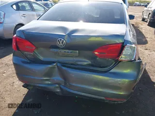 2014 Volkswagen Jetta TDI w/Premium with VIN 3VW3L7AJ9EM383295, listed as a IAAI auction lot 41983218 with 105,077 mi miles and . Bid and sale history available at DreamBid. Image 6.