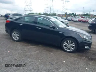 2012 Kia Optima EX z VIN 5XXGN4A76CG051931, wystawiony jako IAAI lot #42373061 z przebiegiem 149 296 mil mil oraz . Historia ofert i sprzedaży dostępna na DreamBid. Obrazek 1.
