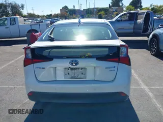 2020 Toyota Prius L Eco with VIN JTDKARFUXL3107211, listed as a IAAI auction lot 42797561 with 328,023 mi miles and . Bid and sale history available at DreamBid. Image 16.