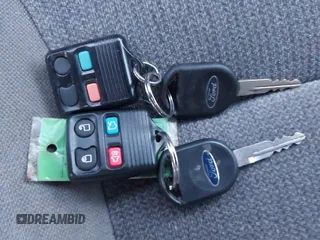 2002 Ford Taurus SE Standard z VIN 1FAFP53U32G242170, wystawiony jako IAAI lot #41299039 z przebiegiem 99 928 mil mil oraz . Historia ofert i sprzedaży dostępna na DreamBid. Obrazek 11.