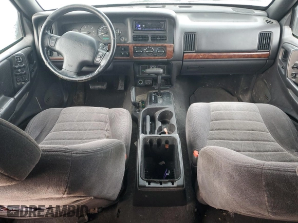 1998 Jeep Grand Cherokee Laredo with VIN 1J4GZ48S1WC165851, listed as a Copart auction lot 84110044 with 306,484 mi miles and Salvage Title. Bid and sale history available at carsss.com. Image 8.