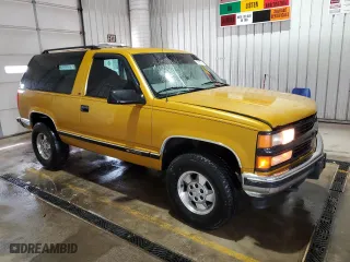 1997 Chevrolet Tahoe with VIN 3GNEK18R1VG104628, listed as a Copart auction lot 53315215 with 195,743 mi miles and Salvage Title. Bid and sale history available at carsss.com. Image 4.