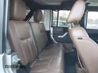 2016 Jeep Wrangler Unlimited 75th Anniversary with VIN 1C4HJWEGXGL149548, listed as a IAAI auction lot 41918007 with 254,655 mi miles. Bid and sale history available at carsss.com. Image 8.