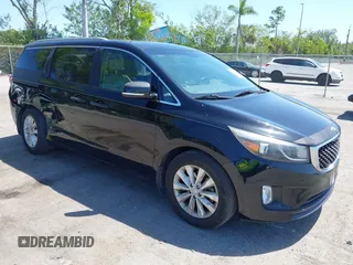 2016 Kia Sedona SX with VIN KNDMC5C15G6143818, listed as a IAAI auction lot 42051284 with 97,666 mi miles and . Bid and sale history available at carsss.com. Image 1.