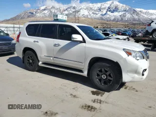2012 Lexus GX 460 Premium with VIN JTJJM7FX4C5042312, listed as a Copart auction lot 47000615 with 242,046 mi miles and Salvage title. Bid and sale history available at DreamBid. Image 4.