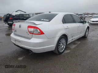 2009 Mercury Milan Premier z VIN 3MEHM08159R604286, wystawiony jako IAAI lot #41614675 z przebiegiem 129 172 mil mil oraz . Historia ofert i sprzedaży dostępna na DreamBid. Obrazek 4.