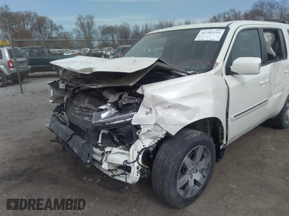 2015 Honda Pilot Touring with VIN 5FNYF4H9XFB047607, listed as a IAAI auction lot 41781534 with 157,252 mi miles. Bid and sale history available at carsss.com. Image 6.