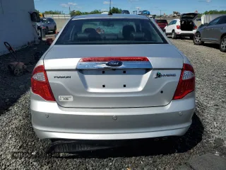 2010 Ford Fusion Hybrid z VIN 3FADP0L36AR211312, wystawiony jako Copart lot #55749425 z przebiegiem 39 223 mil mil oraz Szkoda całkowita • Salvage title. Historia ofert i sprzedaży dostępna na DreamBid. Obrazek 6.