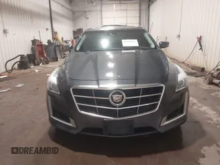 2014 Cadillac CTS Luxury AWD with VIN 1G6AX5S37E0172041, listed as a IAAI auction lot 40343343 with 102,506 mi miles and . Bid and sale history available at DreamBid. Image 12.