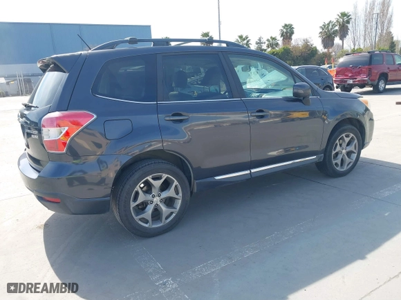 2015 Subaru Forester 2.5i Touring with VIN JF2SJAWC4FH523997, listed as a IAAI auction lot 41884674 with 175,127 mi miles. Bid and sale history available at carsss.com. Image 4.