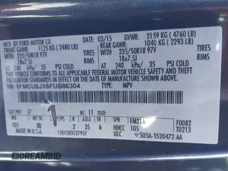 2015 Ford Escape Titanium with VIN 1FMCU9JX6FUB86304, listed as a IAAI auction lot 41595761 with 104,317 mi miles and . Bid and sale history available at DreamBid. Image 9.