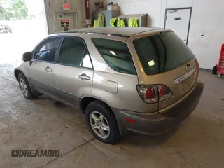 2003 Lexus RX 300 with VIN JTJHF10U030308975, listed as a IAAI auction lot 42632621 with 302,780 mi miles and . Bid and sale history available at DreamBid. Image 3.