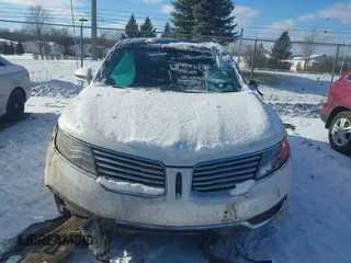 2016 Lincoln MKX Reserve with VIN 2LMTJ8LP3GBL38650, listed as a IAAI auction lot 41338134 with 128,078 mi miles. Bid and sale history available at carsss.com. Image 12.