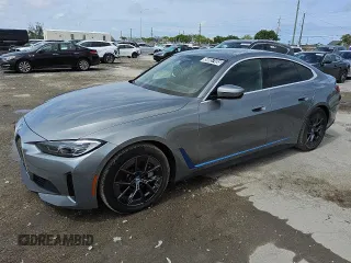 2024 BMW i4 eDrive40 z VIN WBY73AW0XRFS98892, wystawiony jako Copart lot #56057495 z przebiegiem 24 943 mil mil oraz Tytuł czysty. Historia ofert i sprzedaży dostępna na DreamBid. Obrazek 1.