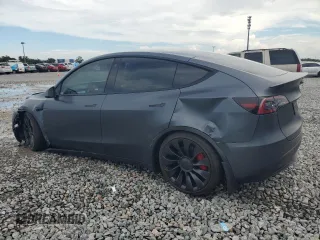 2022 Tesla Model Y Performance с VIN 7SAYGDEF0NF497582, выставлен на аукционе Copart как лот 65131685 с пробегом 50 948 миль миль и Чистый • Clean title. История ставок и продаж доступна на DreamBid. Изображение 2.