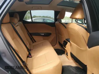 2024 Lexus RZ 450e Premium z VIN JTJAAAAB1RA024965, wystawiony jako Copart lot #54575025 z przebiegiem 4536 mil mil oraz Szkody całkowita. Historia ofert i sprzedaży dostępna na DreamBid. Obrazek 11.