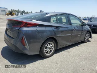 2021 Toyota Prius LE z VIN JTDKAMFPXM3174518, wystawiony jako Copart lot #58854495 z przebiegiem 83 445 mil mil oraz Szkoda całkowita • Salvage title. Historia ofert i sprzedaży dostępna na DreamBid. Obrazek 3.