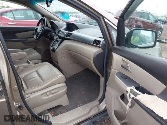 2012 Honda Odyssey EX-L with VIN 5FNRL5H68CB031930, listed as a IAAI auction lot 42222501 with 65,262 mi miles and . Bid and sale history available at DreamBid. Image 5.