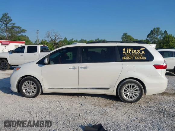 2015 Toyota Sienna XLE with VIN 5TDYK3DC5FS534913, listed as a IAAI auction lot 42052427 with 105,046 mi miles. Bid and sale history available at carsss.com. Image 14.