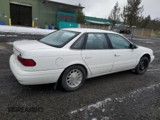 1994 Ford Taurus z VIN 1FALP5344RA291510, wystawiony jako Copart lot #43854925 z przebiegiem 69 067 mil mil oraz Tytuł czysty. Historia ofert i sprzedaży dostępna na DreamBid. Obrazek 3.