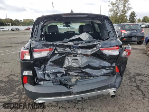 2021 Ford Escape Titanium with VIN 1FMCU9J98MUA73257, listed as a Copart auction lot 74838394 with 41,294 mi miles and Salvage Title. Bid and sale history available at carsss.com. Image 6.