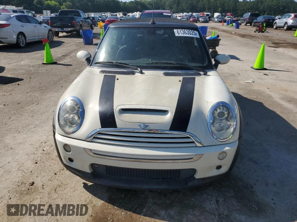 2006 MINI Convertible S с VIN WMWRH33546TF85908, выставлен на аукционе Copart как лот 61363025 с пробегом 105 053 миль миль и Списание • Salvage title. История ставок и продаж доступна на DreamBid. Изображение 5.