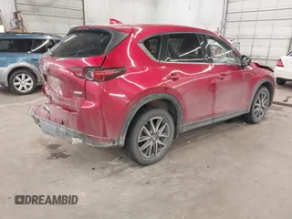 2018 Mazda CX-5 Grand Touring with VIN JM3KFBDM5J0414013, listed as a IAAI auction lot 42013479 with 88,225 mi miles and . Bid and sale history available at DreamBid. Image 4.