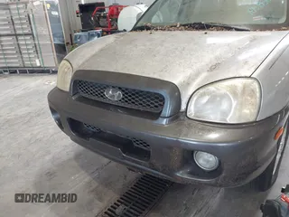 2003 Hyundai Santa Fe GLS z VIN KM8SC13D03U468114, wystawiony jako IAAI lot #42399443 z przebiegiem 185 851 mil mil oraz . Historia ofert i sprzedaży dostępna na DreamBid. Obrazek 6.