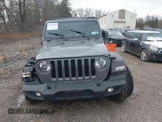 2021 Jeep Wrangler Sport S with VIN 1C4GJXAN9MW768559, listed as a IAAI auction lot 41238254 with 18,191 mi miles and . Bid and sale history available at DreamBid. Image 12.