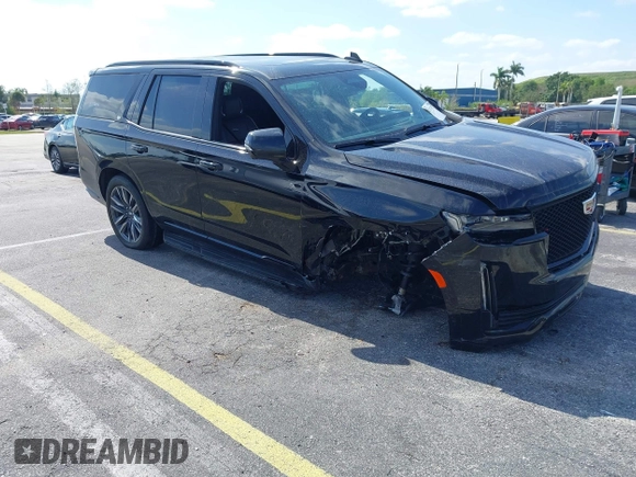 2023 Cadillac Escalade 4WD Sport z VIN 1GYS4EKLXPR513435, wystawiony jako IAAI lot #42137452 z przebiegiem 27 495 mil mil oraz . Historia ofert i sprzedaży dostępna na DreamBid. Obrazek 1.
