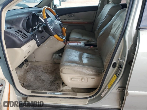 2007 Lexus RX 400h z VIN JTJGW31U972001465, wystawiony jako Copart lot #42049045 z przebiegiem 75 325 mil mil oraz Szkody całkowita. Historia ofert i sprzedaży dostępna na DreamBid. Obrazek 7.
