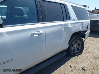 2019 Chevrolet Suburban LT with VIN 1GNSKHKC2KR297254, listed as a IAAI auction lot 41765492 with 63,058 mi miles. Bid and sale history available at carsss.com. Image 6.