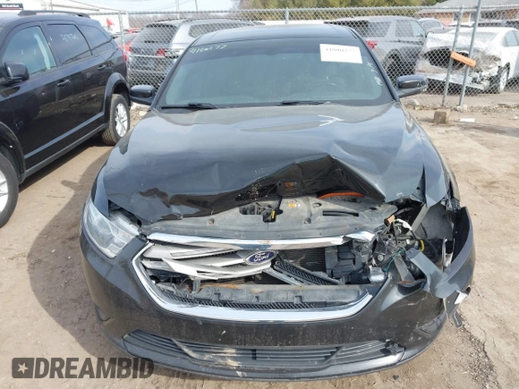 2013 Ford Taurus SEL with VIN 1FAHP2E84DG188503, listed as a IAAI auction lot 41800277 with 215,015 mi miles. Bid and sale history available at carsss.com. Image 12.