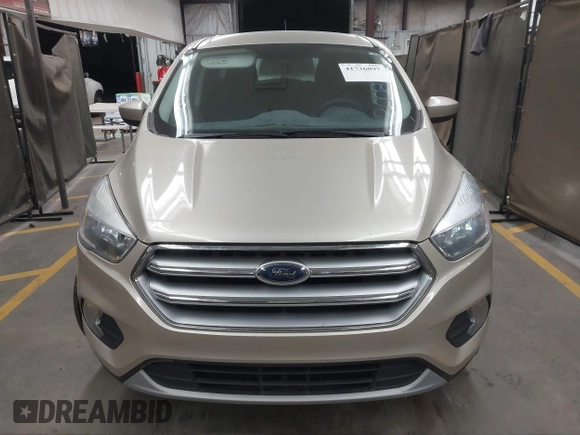 2017 Ford Escape SE z VIN 1FMCU0GD5HUD42585, wystawiony jako IAAI lot #41736097 z przebiegiem 72 501 mil mil oraz . Historia ofert i sprzedaży dostępna na DreamBid. Obrazek 12.