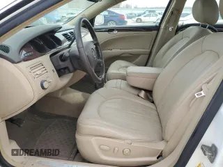 2010 Buick Lucerne CXL with VIN 1G4HC5EM6AU106722, listed as a Copart auction lot 48975355 with 51,444 mi miles and Salvage Title. Bid and sale history available at DreamBid. Image 7.