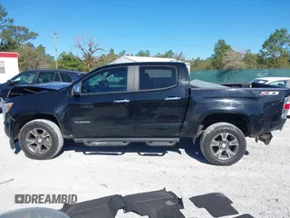 2016 Chevrolet Colorado 2WD Z71 z VIN 1GCGSDE39G1253003, wystawiony jako IAAI lot #41830474 z przebiegiem 74 000 mil mil oraz . Historia ofert i sprzedaży dostępna na DreamBid. Obrazek 15.