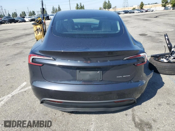 2025 Tesla Model 3 Long Range z VIN 5YJ3E1EB0SF986178, wystawiony jako Copart lot #57612115 z przebiegiem Nie podano mil oraz Szkoda całkowita • Salvage title. Historia ofert i sprzedaży dostępna na DreamBid. Obrazek 6.