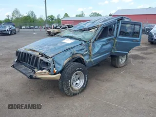 1997 Jeep Cherokee Sport with VIN 1J4FJ68S8VL557562, listed as a IAAI auction lot 42157736 with Not provided miles and . Bid and sale history available at DreamBid. Image 2.