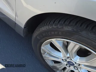2020 Ford Edge Titanium with VIN 2FMPK4K92LBA30658, listed as a IAAI auction lot 42848998 with 63,460 mi miles and . Bid and sale history available at DreamBid. Image 1.