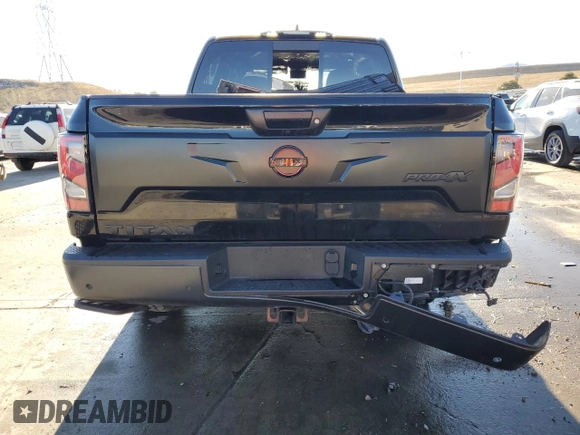2024 Nissan Titan Pro-4X z VIN 1N6AA1ED8RN104641, wystawiony jako Copart lot #83624614 z przebiegiem 19 065 mil mil oraz Szkoda całkowita • Salvage title. Historia ofert i sprzedaży dostępna na DreamBid. Obrazek 6.