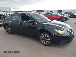 2016 Nissan Altima SV with VIN 1N4AL3AP3GC229411, listed as a IAAI auction lot 39734206 with 109,105 mi miles and . Bid and sale history available at DreamBid. Image 14.