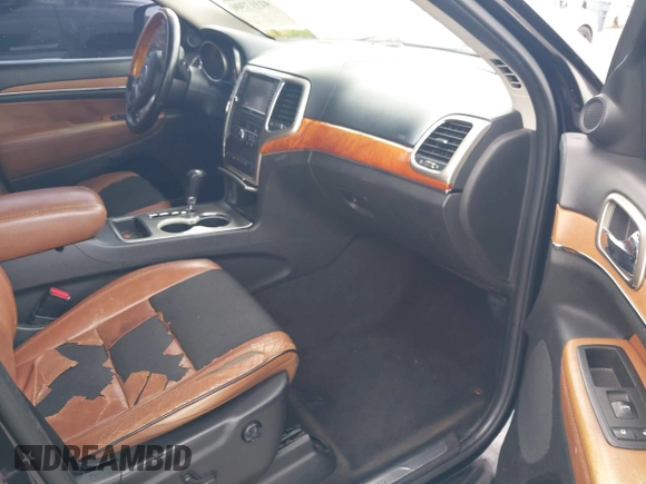 2012 Jeep Grand Cherokee Overland with VIN 1C4RJECT4CC299549, listed as a IAAI auction lot 41917306 with 229,256 mi miles. Bid and sale history available at carsss.com. Image 5.