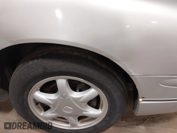 2004 Buick Regal LS with VIN 2G4WB52K041324734, listed as a IAAI auction lot 41225740 with 64,583 mi miles and . Bid and sale history available at DreamBid. Image 12.