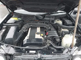 1996 Mercedes-Benz E-Class with VIN WDBJF55F0TJ007170, listed as a IAAI auction lot 41147514 with 122,044 mi miles. Bid and sale history available at carsss.com. Image 10.