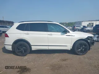 2023 Volkswagen Tiguan SE R-Line Black z VIN 3VV8B7AX9PM055640, wystawiony jako IAAI lot #42411380 z przebiegiem 68 922 mil mil oraz . Historia ofert i sprzedaży dostępna na DreamBid. Obrazek 12.