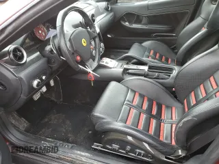 2007 Ferrari 599 z VIN ZFFFC60A470151593, wystawiony jako Copart lot #49111315 z przebiegiem 41 170 mil mil oraz Tytuł czysty. Historia ofert i sprzedaży dostępna na DreamBid. Obrazek 7.