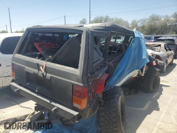 1991 Jeep Cherokee с VIN 1J4FJ58S6ML588768, выставлен на аукционе Copart как лот 49748515 с пробегом 193 621 миль миль и На запчасти • Non repairable. История ставок и продаж доступна на DreamBid. Изображение 3.