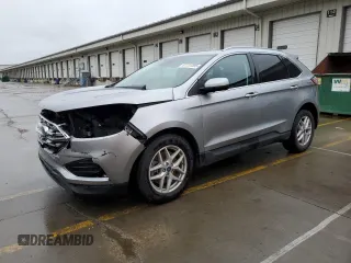 2021 Ford Edge SEL с VIN 2FMPK4J92MBA11014, выставлен на аукционе Copart как лот 61131095 с пробегом 64 316 миль миль и Списание • Salvage title. История ставок и продаж доступна на DreamBid. Изображение 1.