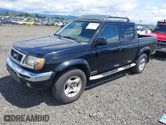 2000 Nissan Frontier XE with VIN 1N6ED27T3YC422325, listed as a IAAI auction lot 42268431 with 169,994 mi miles and . Bid and sale history available at DreamBid. Image 2.
